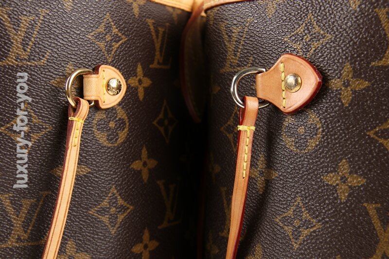 Wie entferne ich Wasserflecken von meiner Louis Vuitton Handtasche? 